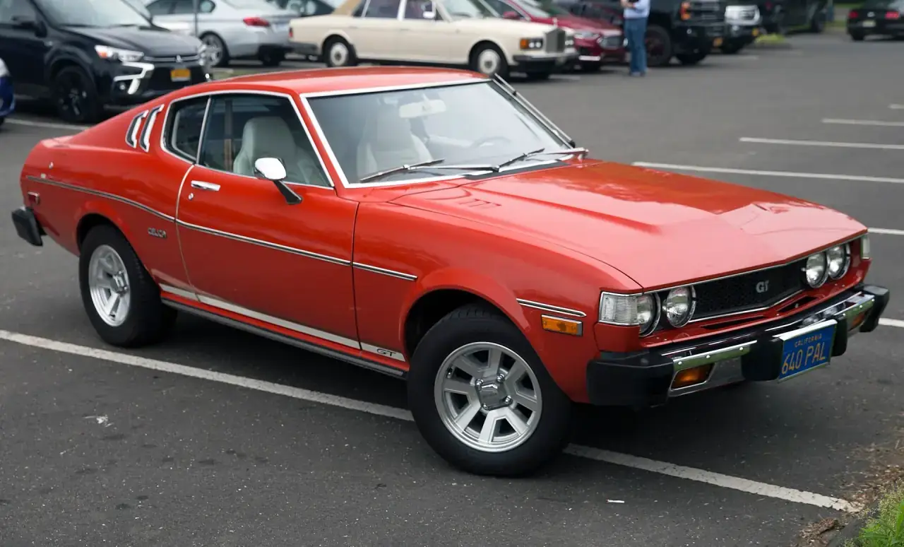 A classic Japanese sports coupe photographed from the front right.
